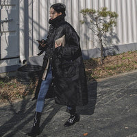 Damen wattierter Longline-Mantel mit hohem Stehkragen und Steppnähten - Schwarz