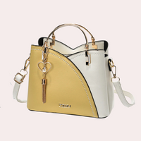 Elegante Damenhandtasche aus stilvollem veganem Leder - Gelb
