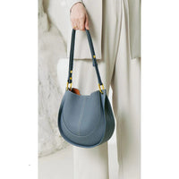 Elegante, runde Damen-Schultertasche aus Leder - Blau