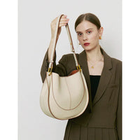 Elegante, runde Damen-Schultertasche aus Leder - Weiß