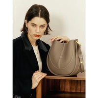 Elegante, runde Damen-Schultertasche aus Leder - Grau
