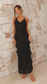 Patricia - Maxikleid mit Halterhals und gestuften Rüschen und offenem Rücken - Schwarz