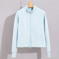 Damen Performance-Trainingsjacke mit Stehkragen und Daumenloch Nord Taschen - Himmelblaues Oberteil