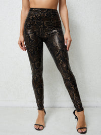 Damen Hochglänzende Leggings im Schlangenmuster - Gold