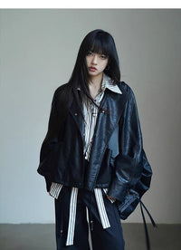 Damen Oversized Bikerjacke aus Kunstleder mit breitem Revers und voluminösen Ärmeln Nord Taschen - Schwarz