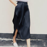 Damen Plissierter Midi-Rock mit asymmetrischem Saum Nord Taschen - Schwarz