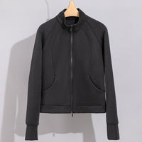 Damen Performance-Trainingsjacke mit Stehkragen und Daumenloch Nord Taschen - Dunkelgraues Oberteil