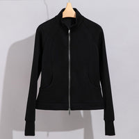Damen Performance-Trainingsjacke mit Stehkragen und Daumenloch Nord Taschen - Schwarzes Oberteil