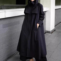 Damen wasserabweisender Oversize-Regenmantel mit Kapuze und A-Linie - Schwarz