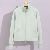 Damen Performance-Trainingsjacke mit Stehkragen und Daumenloch Nord Taschen - Wellengrün Oberteil