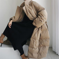 Damen Maxi-Steppmantel mit hohem Stehkragen und winddichter Wattierung - Khaki