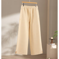 Damen weite French‑Terry Lounge-Sweatpant mit hohem Bund, Kordelzug und seitlichen Schlitzen Nord Taschen - Warmgelbe Hose
