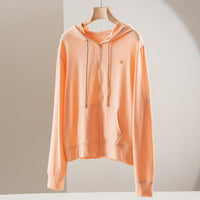 Damen leichte Kapuzen-Sweatjacke aus Slub-Jersey mit durchgehendem Reißverschluss und Kängurutaschen Nord Taschen - Orange