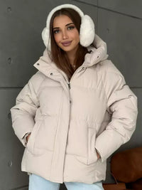 Damen Oversized Steppjacke mit Kapuze und integrierten Taschen - Aprikosenfarbe