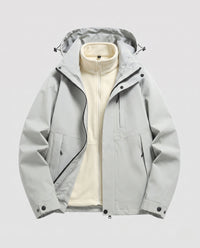 Unisex wasserdichte Softshell-Allwetterjacke mit herausnehmbarer Fleece-Innenjacke und Kapuze - Kieselgrau