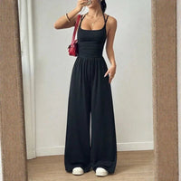 Bela™ Langer Jumpsuit mit weitem Bein, Doppelträgern und offenem Rücken - Schwarz