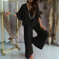 Biarritz™ Set — V-Ausschnitt-Bluse & Palazzo-Hose mit verstellbarem Kordelzugbund - Schwarz