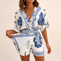 Azzurine™ Skort-Jumpsuit Mit Wickeloptik, Seitlicher Bindung Und Exklusivem Mediterranem Print - Blau