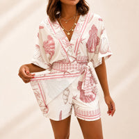 Azzurine™ Skort-Jumpsuit Mit Wickeloptik, Seitlicher Bindung Und Exklusivem Mediterranem Print - Rosa