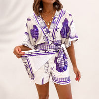 Azzurine™ Skort-Jumpsuit Mit Wickeloptik, Seitlicher Bindung Und Exklusivem Mediterranem Print - Lila