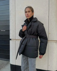 Damen Gesteppte Pufferjacke mit Gürtel breitem Kragen und gerippten Bündchen - Schwarz