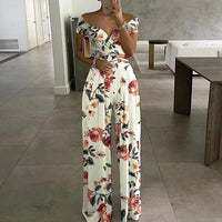 Damen Jumpsuit mit Off-Shoulder-Ausschnitt und Wickeloberteil mit weitem Bein - Weiß mit Blumendruck