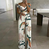 Damen Jumpsuit mit Off-Shoulder-Ausschnitt und Wickeloberteil mit weitem Bein - Weiß mit Tropikaldruck