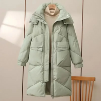 Damen Lange Steppjacke mit Stehkragen Verdecktem Reißverschluss Pattentaschen und Langen Ärmeln - Hellgrün