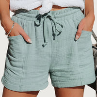 Damen Shorts mit elastischem Bund und Kordelzug sowie aufgesetzten Taschen und umgeschlagenen Säumen - Hellgrün