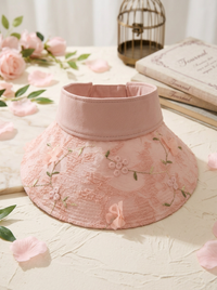 Faltbarer Strohhut mit Blumenakzent und UV-Schutz - Rosa