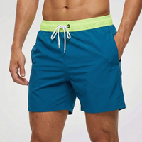 Kurze Herren-Badeshorts mit Kontrastbund - Grün Blau