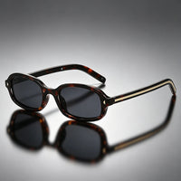 Unisex Sonnenbrille mit ovalem Rahmen in Schildpatt-Optik - Schwarzer Leopard